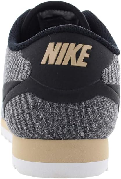 Nike Cortez Ultra SE sneaker heel with NIKE logo, gray fabric and black collar