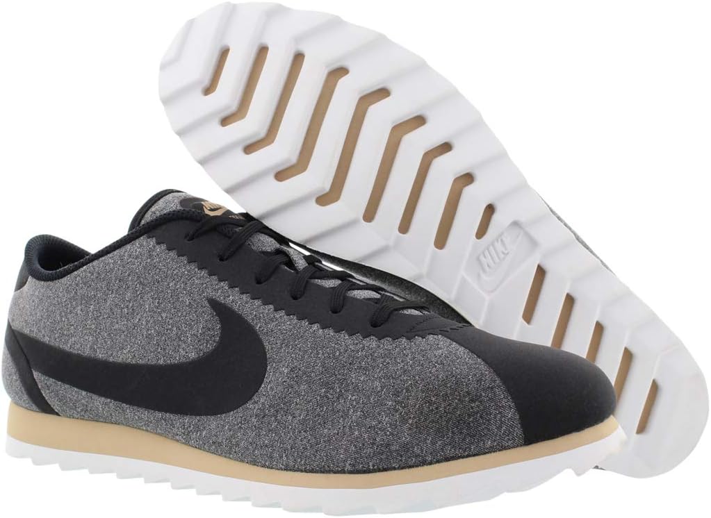Nike Cortez Ultra SE sneaker side with tread sole, gray upper and black swoosh