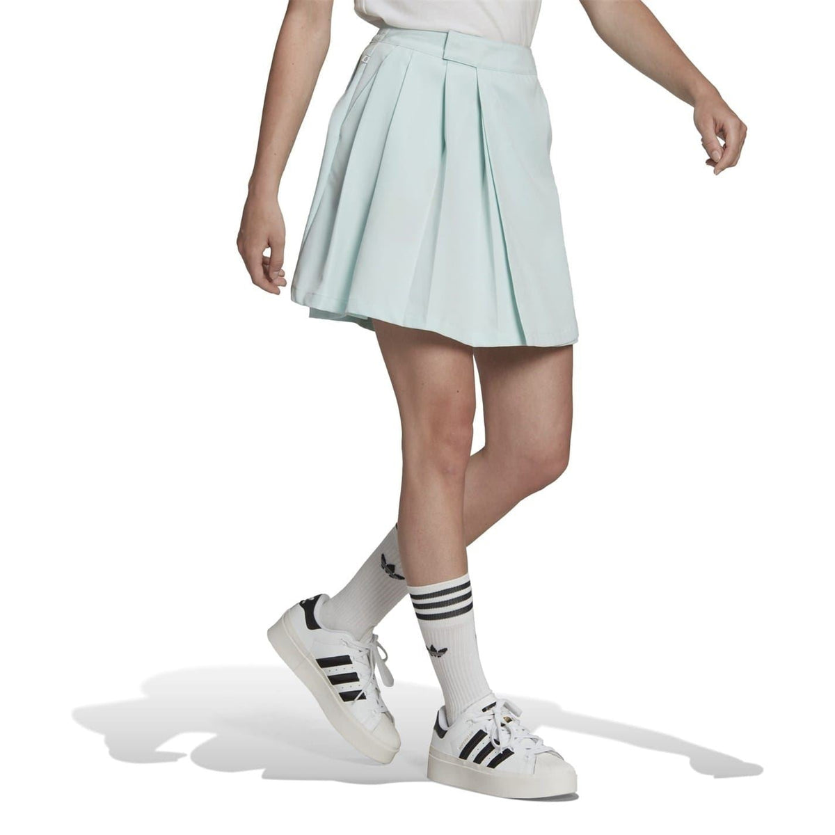 adidas Originals Adicolour contemporary tailored skirt in vibrant fabric, shown with sleek design and modern fit.