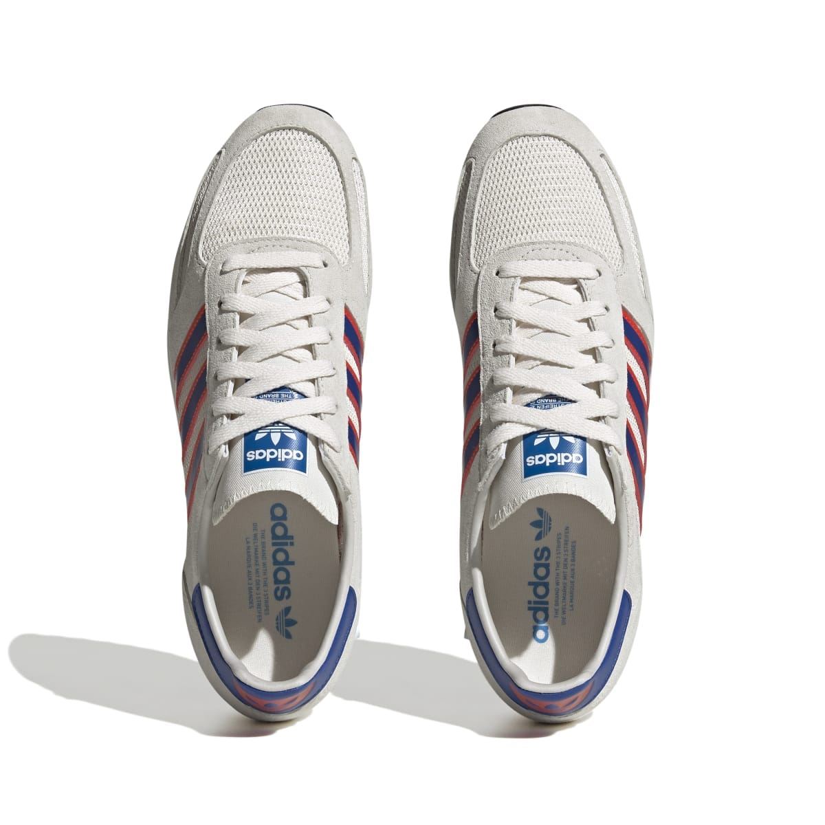Pair of men's adidas Originals LA trainers with white laces and blue-red stripe uppers