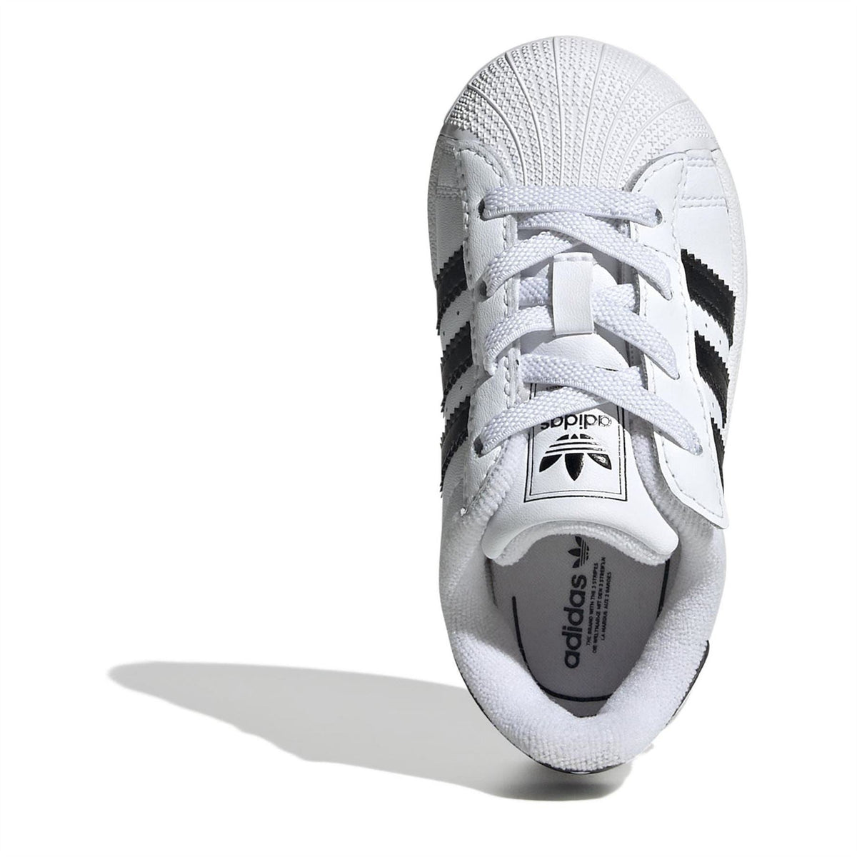 Kids adidas Superstar II sneakers, inside view with white upper and adidas logo label