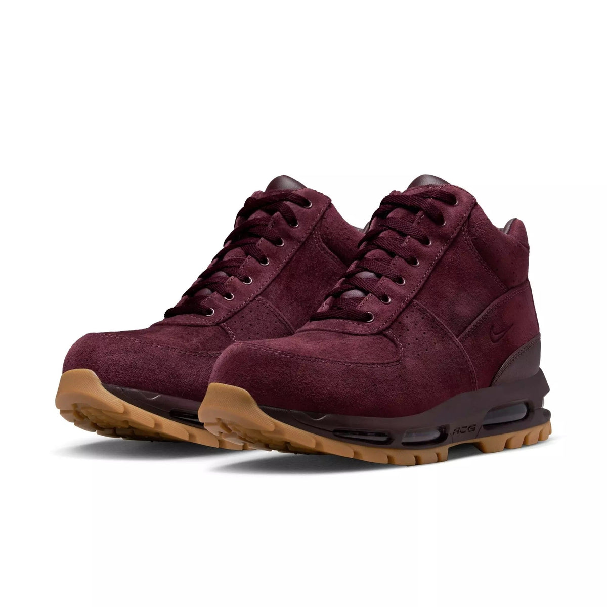 Pair of burgundy suede high-top sneakers with lace-up closure and gum outsoles