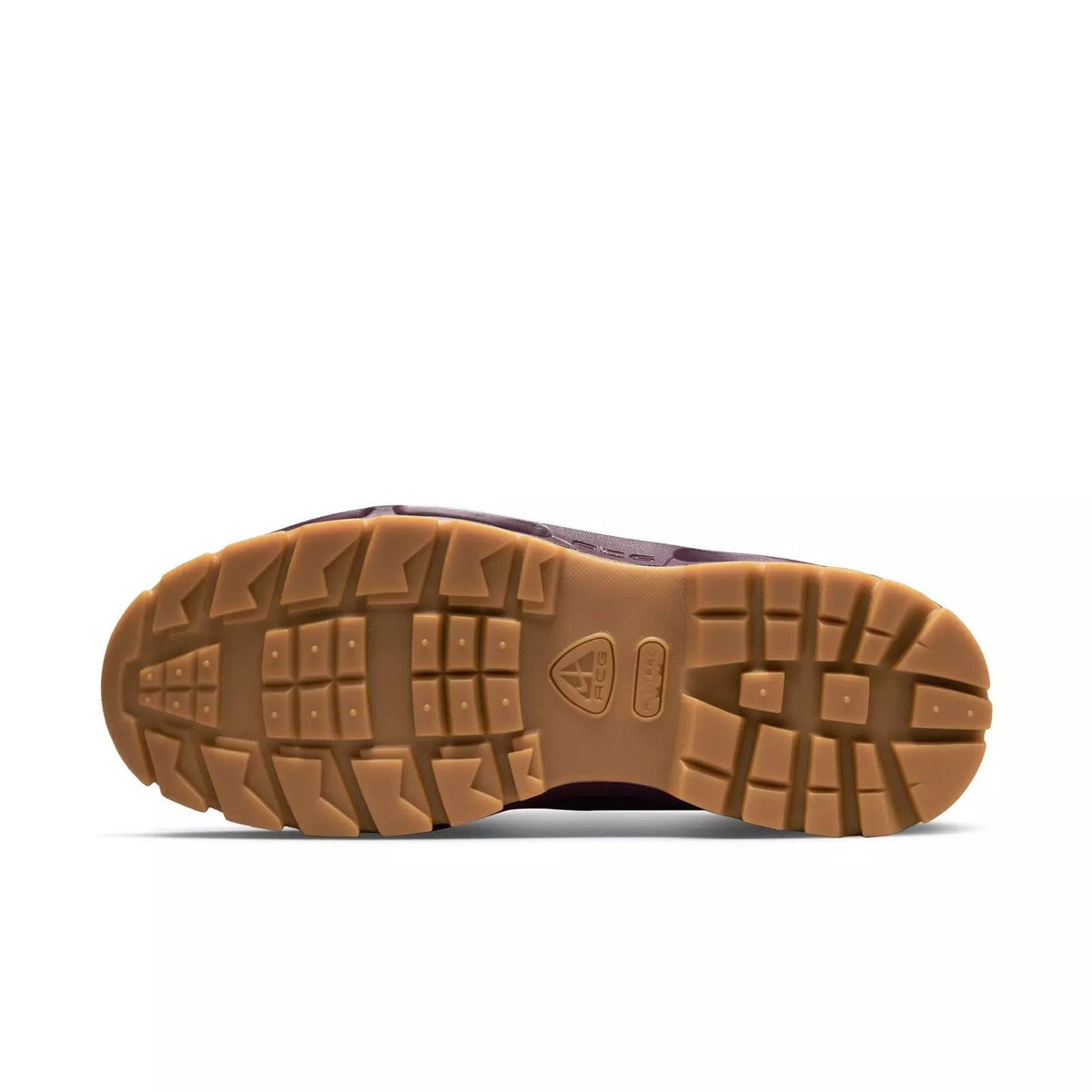Burgundy suede sneaker outsole with textured tread and gum rubber base