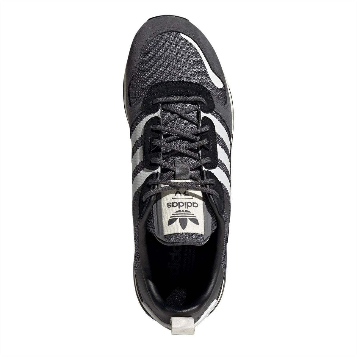 adidas Originals ZX 700 HD low-top trainers in black and white with cushioned soles and stylish design.