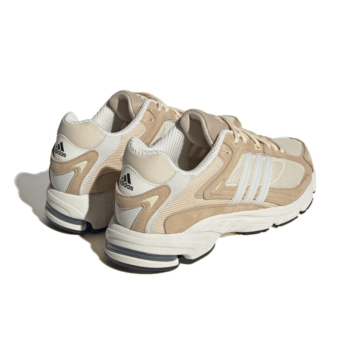 Sand and off-white trainers from heel and side with lace-up front and cushioned collar