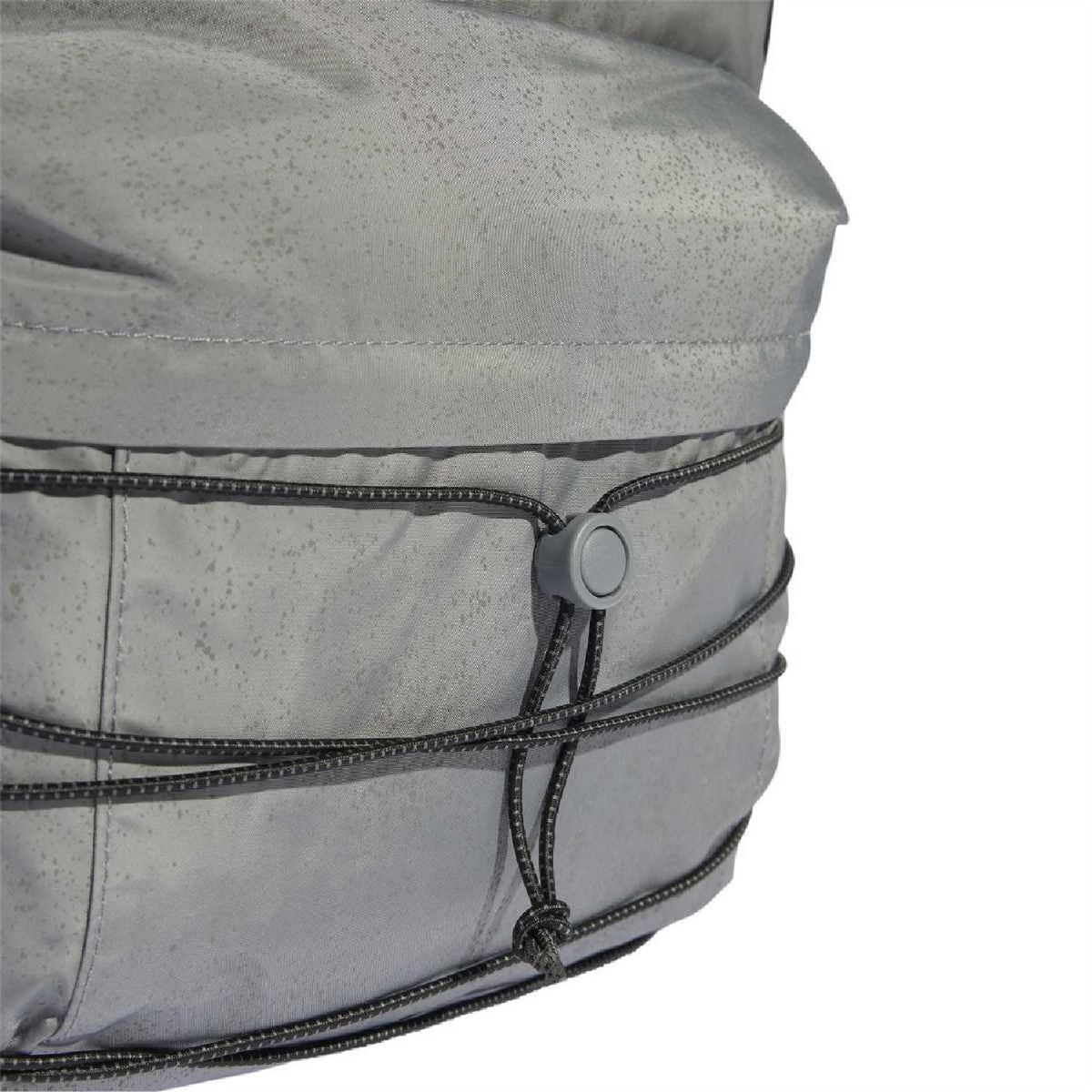 Reflective silver-gray front zipper pocket with cord pull and stitched panels