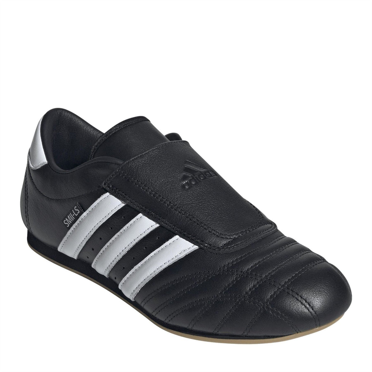adidas Originals Adidas Taekwondo footwear showing black and white design with logo details and athletic style.