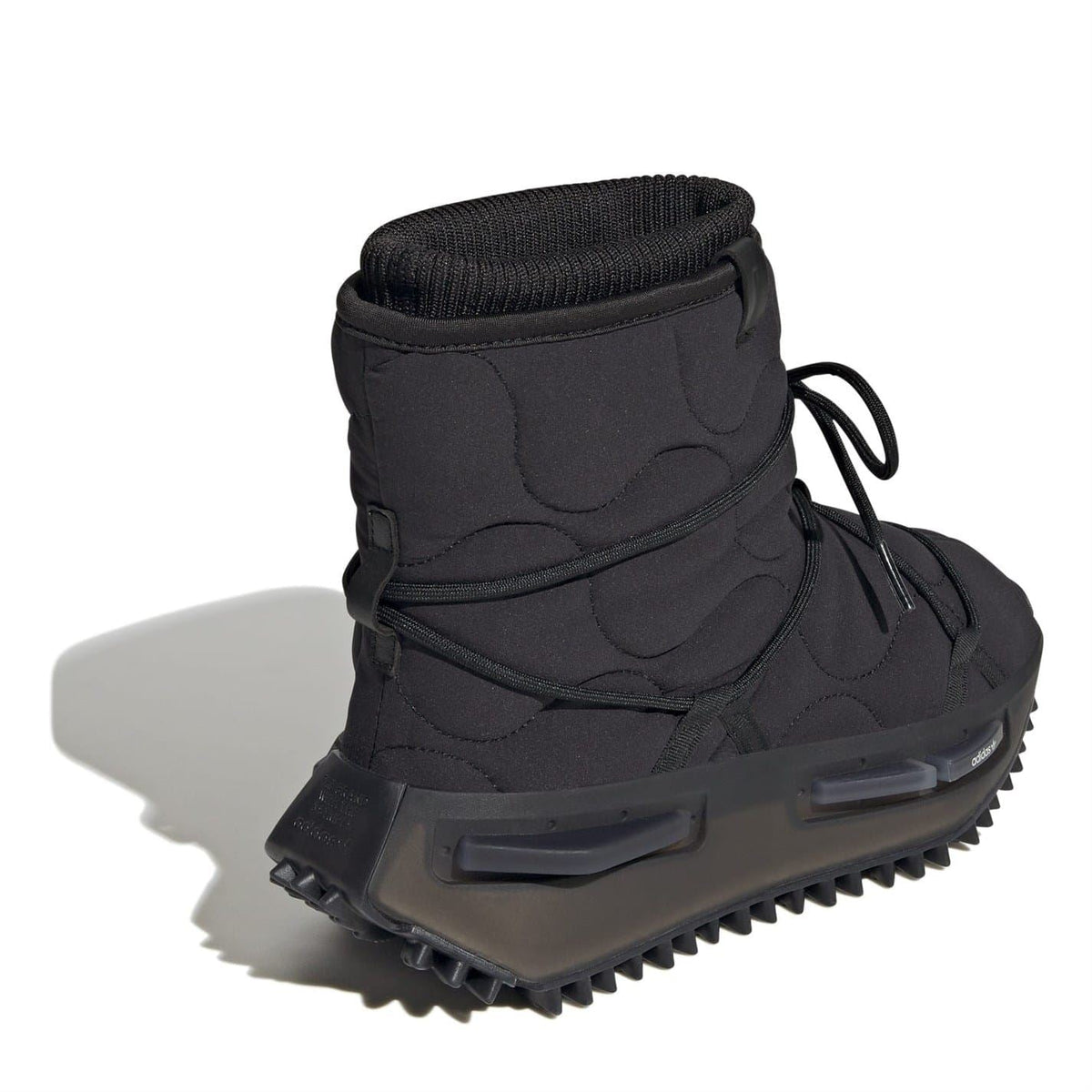 Black Adidas boot with high collar, lace-up ties, and chunky outsole with traction lugs.