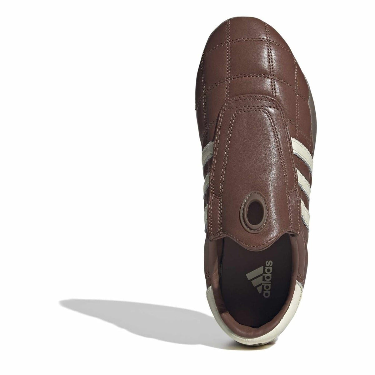 Brown adidas Originals low top sneakers with slip-on opening and heel logo patch.