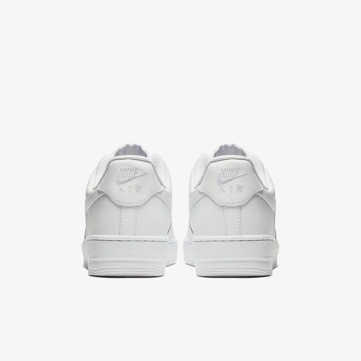 White sneakers from the back with Nike Air badge on the heel