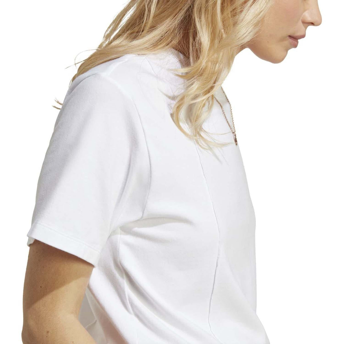 White crew-neck short-sleeve T-shirt close-up, showing back seam and smooth fabric