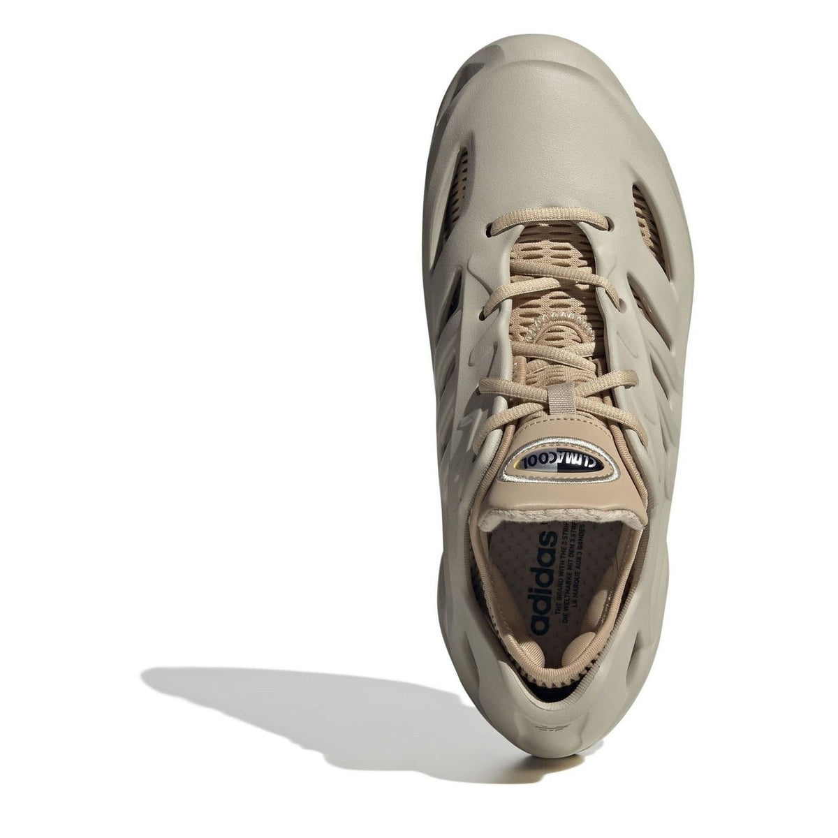 adidas low-top sneakers, light gray lace-up upper and chunky sole