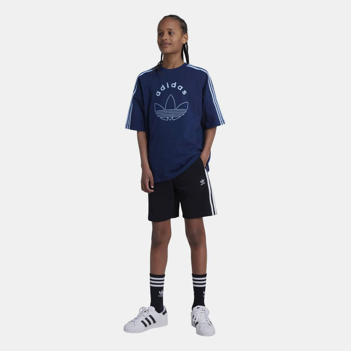 Junior adidas Originals Adicolor shorts in vibrant color, made for ages 8-16, featuring a sporty design and comfortable fit.