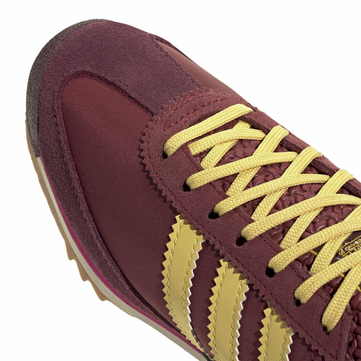 adidas Originals Sl72 shoes, classic white footwear with retro design, featuring laces and branded accents.