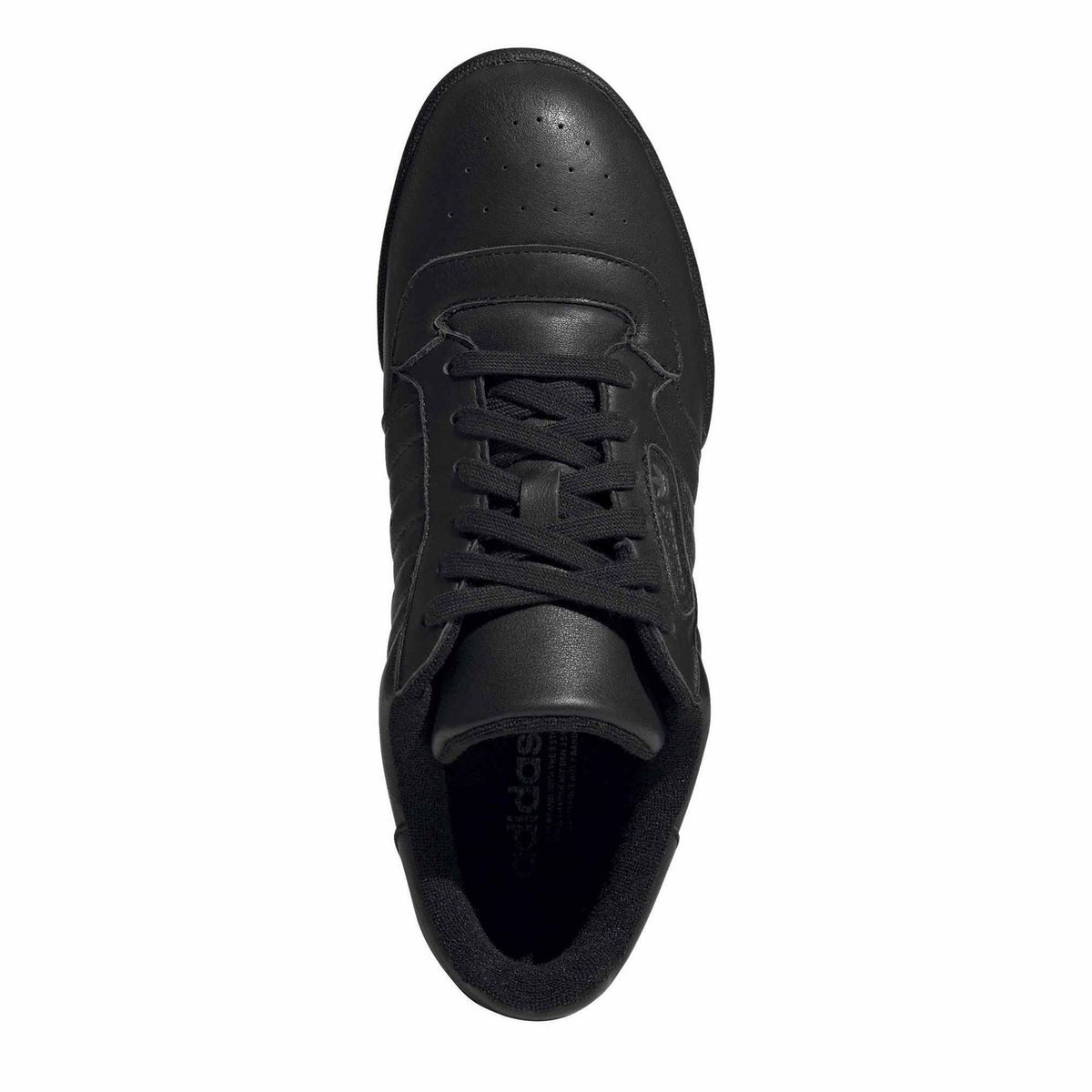 Black low-top sneakers viewed from toe, with lace-up top and padded interior