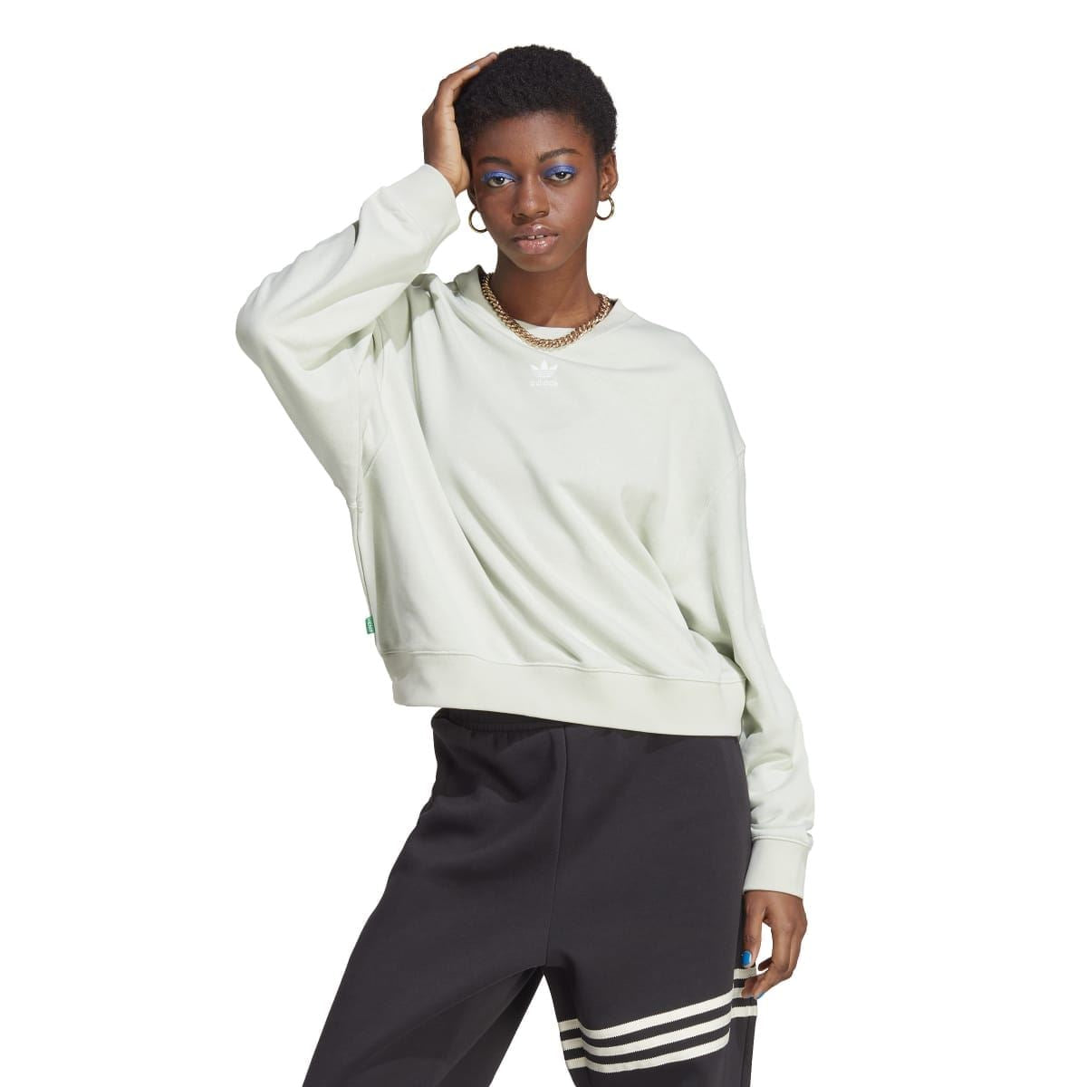 Women’s pale light green crewneck sweatshirt with ribbed cuffs and straight hem