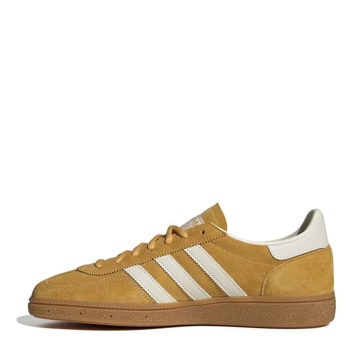 Tan suede low top sneakers with white side stripes and padded white collar lining.