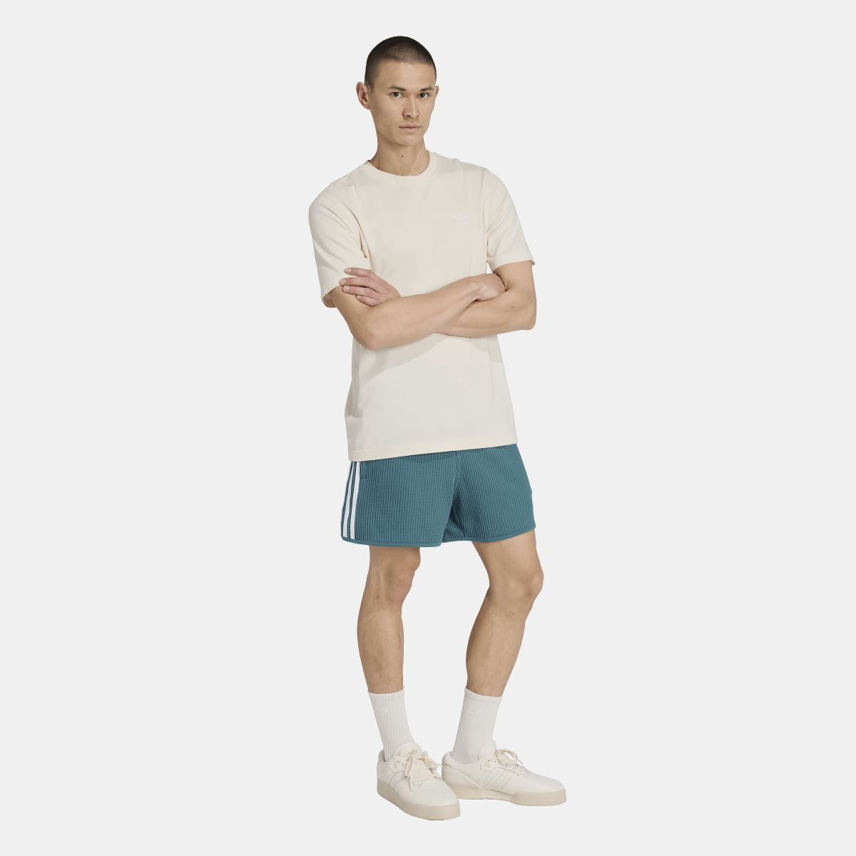 adidas Originals waffle knit sprinter shorts, teal-green with logo and striped sides