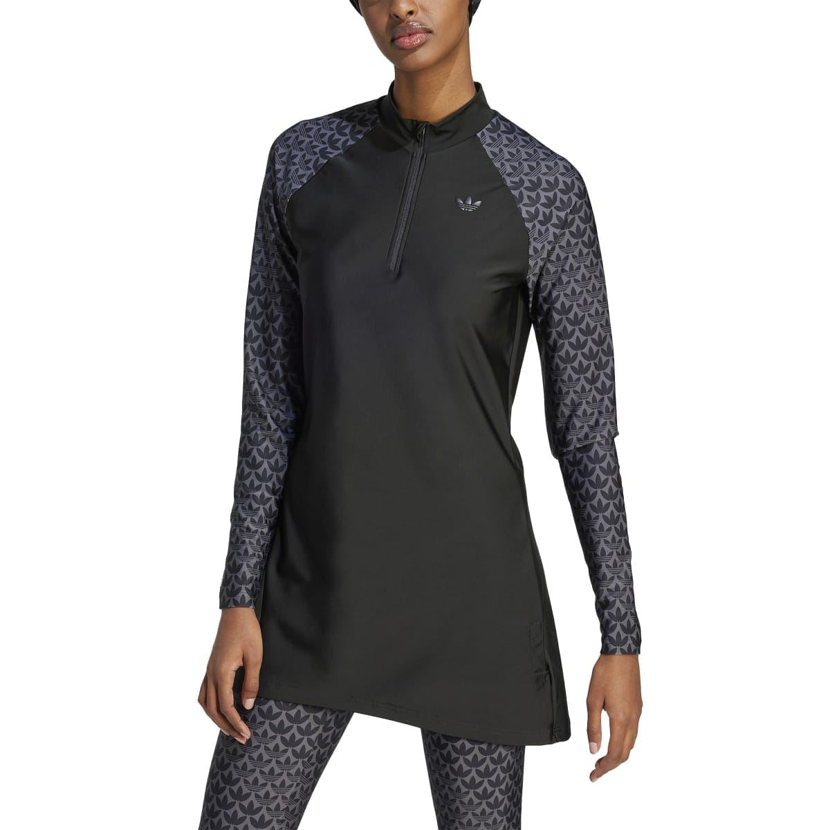 Black long-sleeve swim top with front zipper and monogram sleeve print