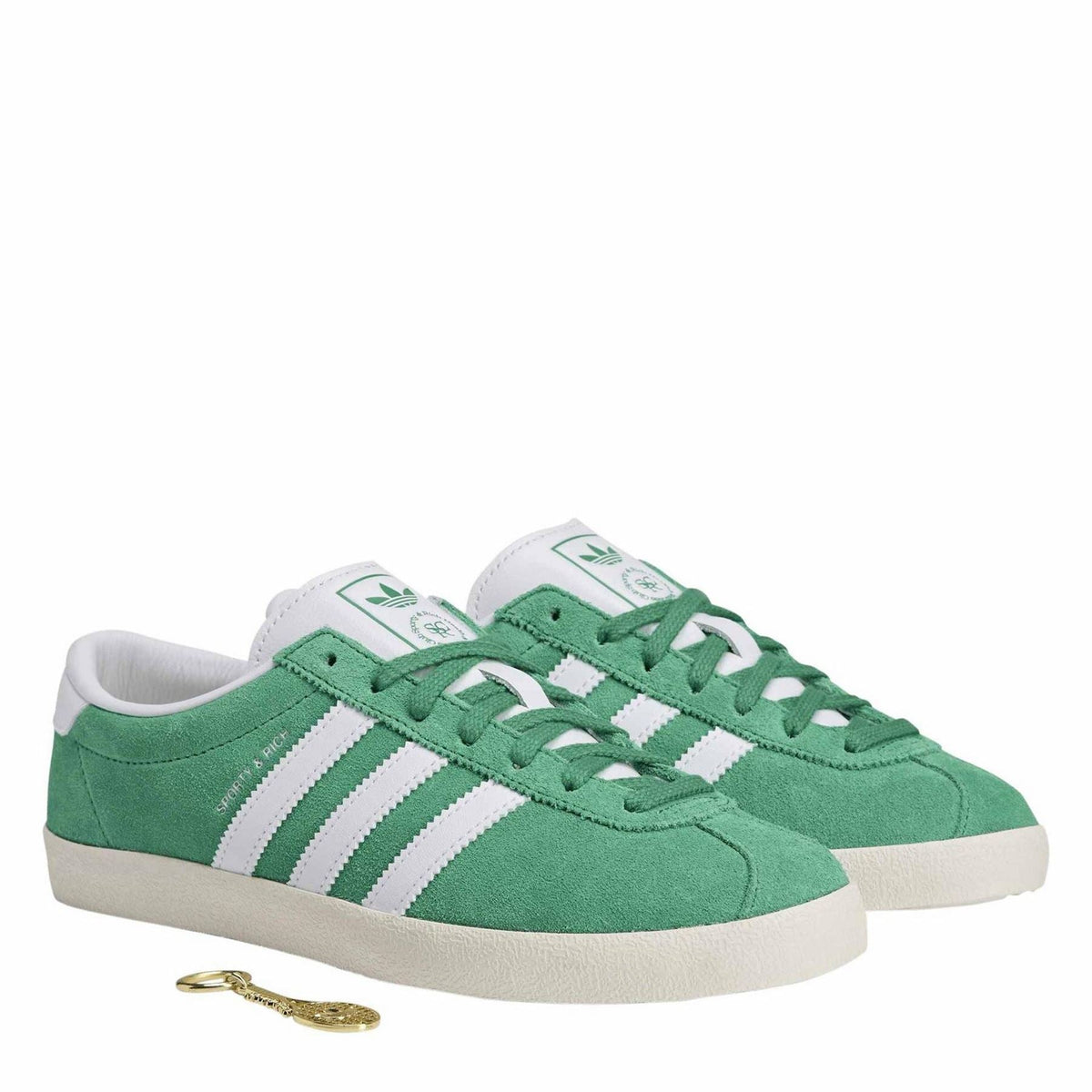 Court-style trainers, court green suede with white stripes and green laces