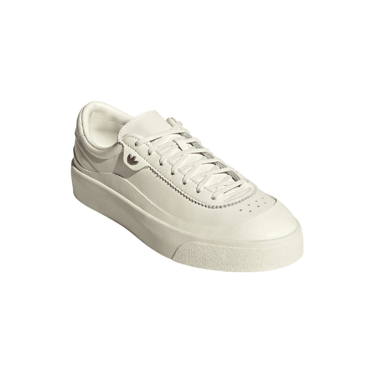 White leather trainers with adidas Swoosh on side, lace-up tongue, and chunky sole.