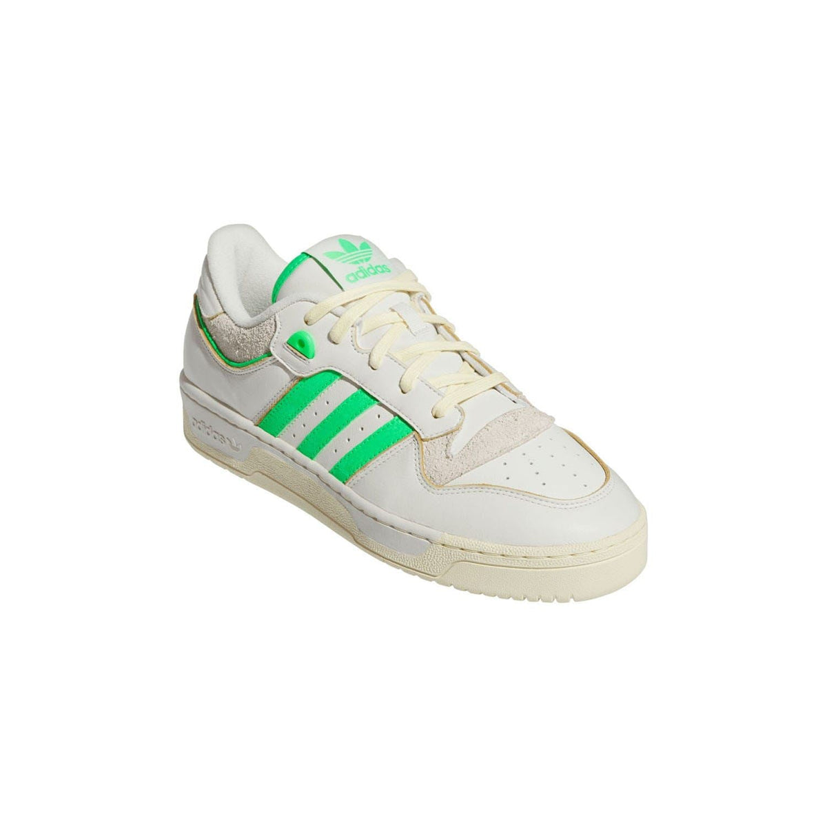 adidas Originals rivalry low-top trainers, side view in white with green stripe detailing