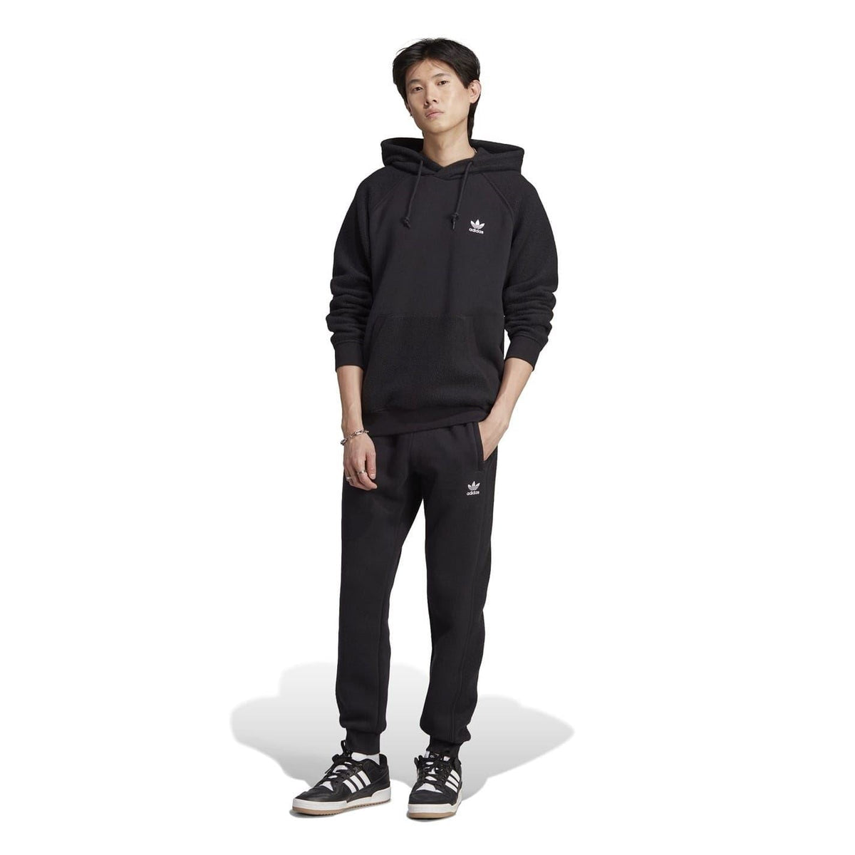 Black adidas Originals jogger pants with matching hooded top styling