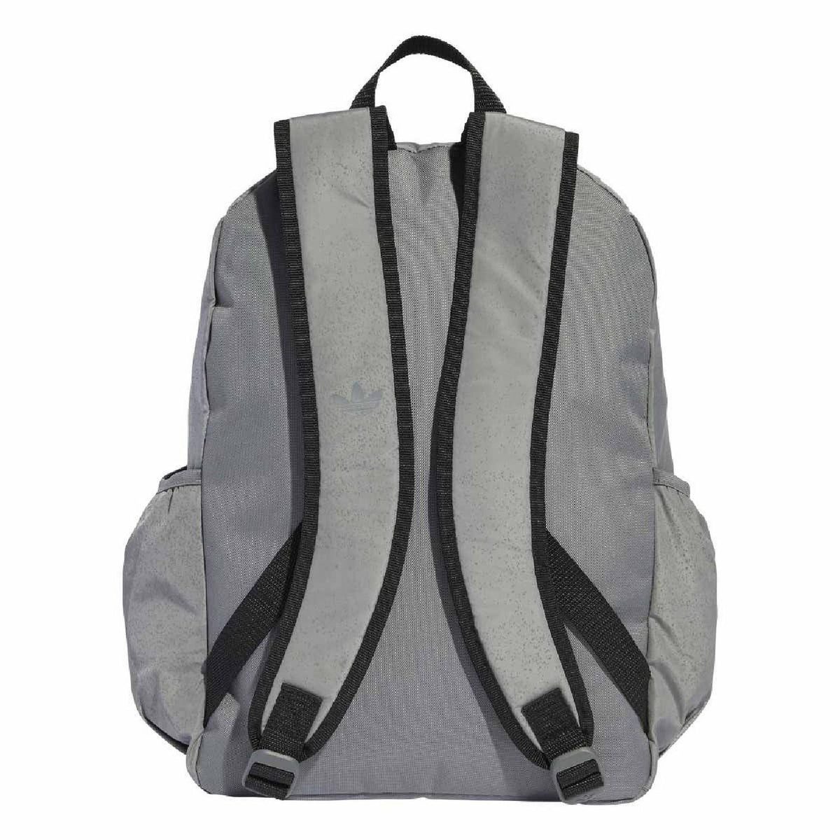 Reflective silver-gray backpack back panel with padded straps and black webbing
