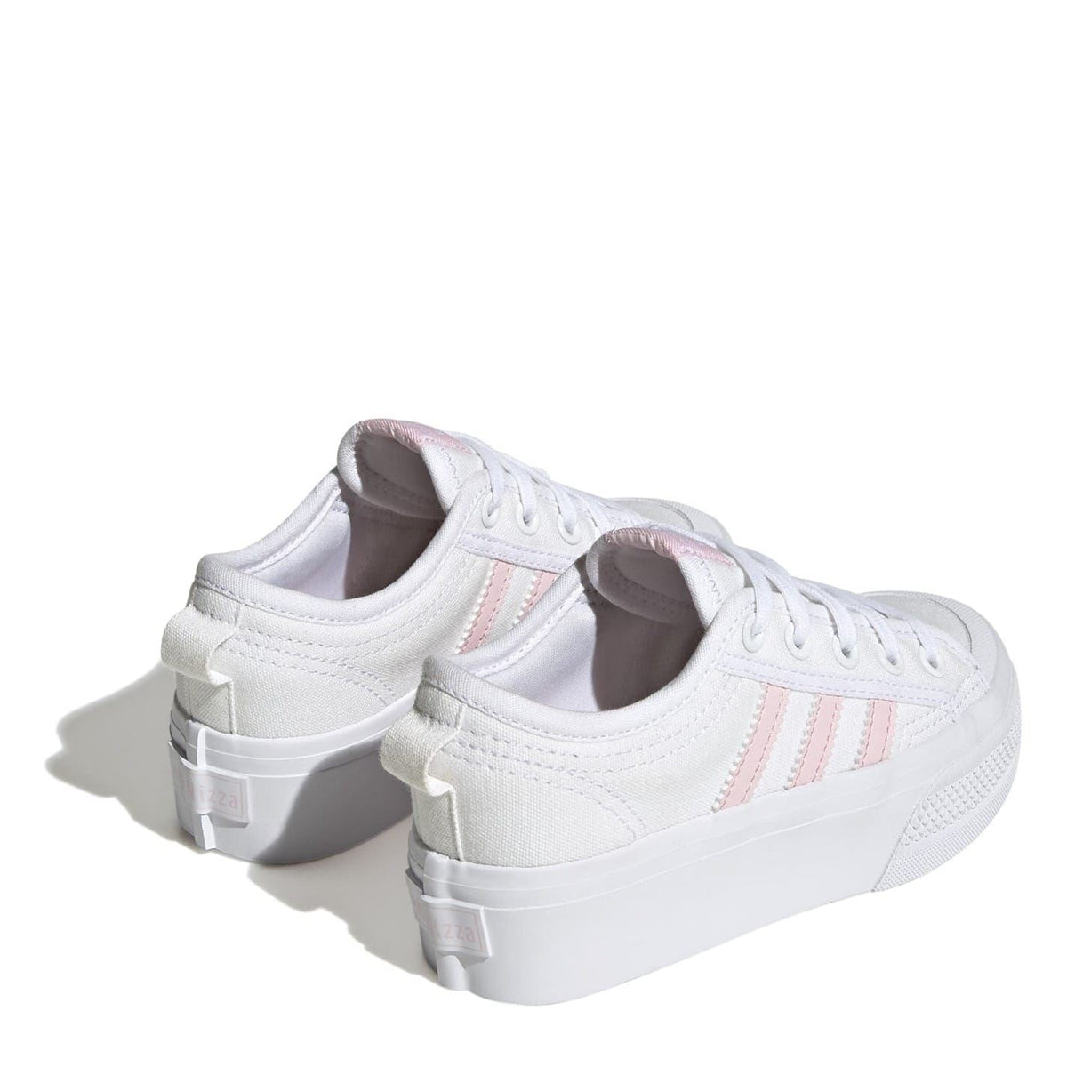 Back view of kids' white platform sneakers with heel tabs and pink stripes