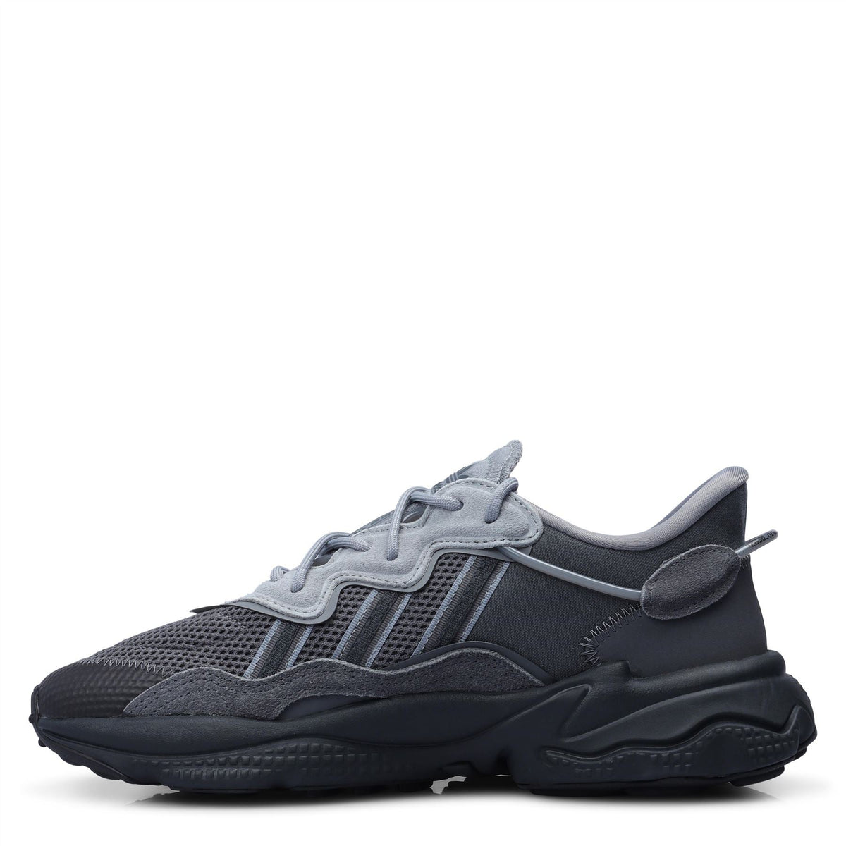 adidas Originals Ozweego trainers in grey and white with chunky sole and sporty design, perfect for casual wear and athletic style