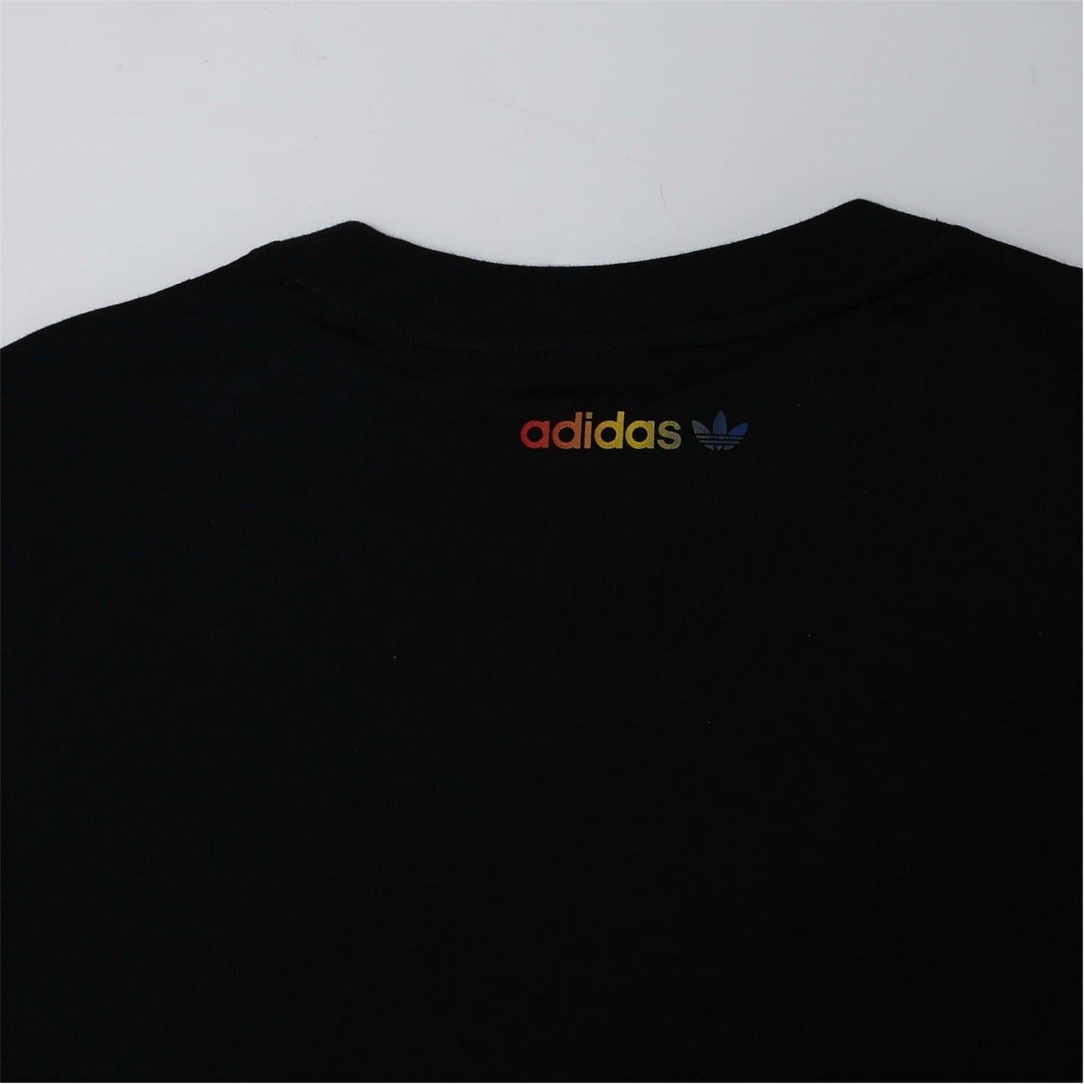 Black crew-neck T-shirt back with small adidas logo near neckline
