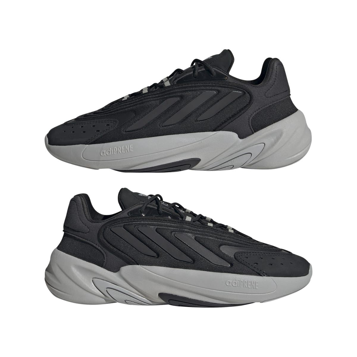 Pair of black lace-up trainers with chunky light-gray soles and adidas Originals branding