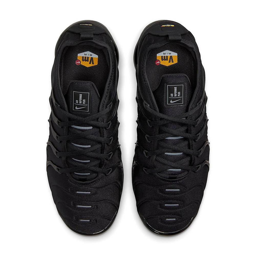 Nike Air Vapormax Plus shoes, black upper and laces, yellow logo on insole