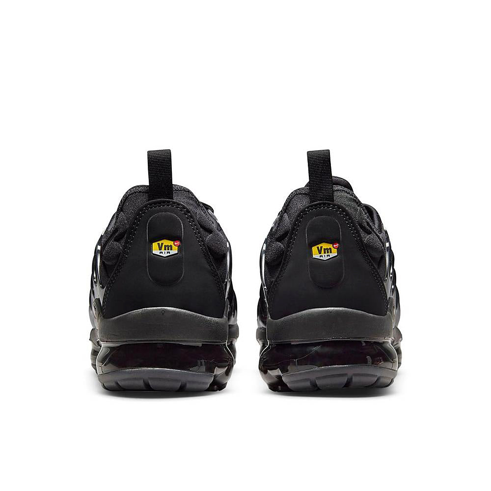 Nike Air Vapormax Plus shoes, black heel with pull tab and cushioned sole