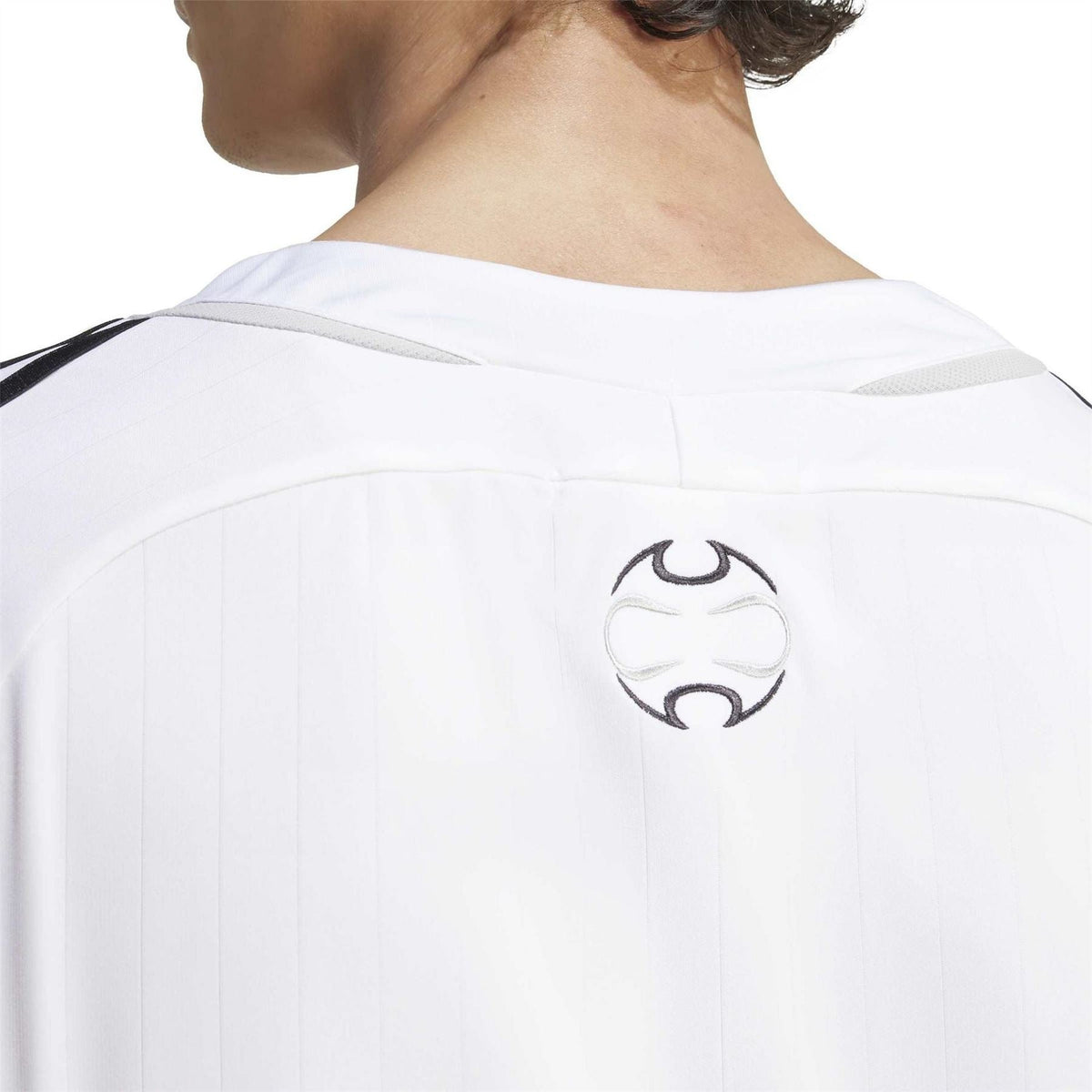 White adidas T-shirt back with circular black adidas emblem