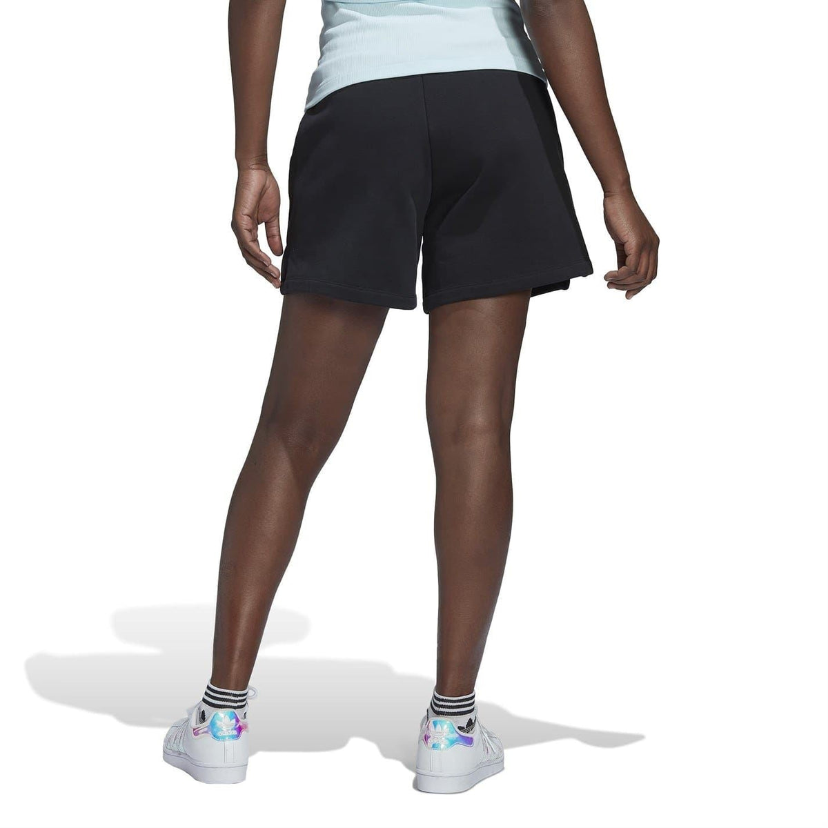 Black adidas Originals shorts, back view with elastic waistband and straight hem