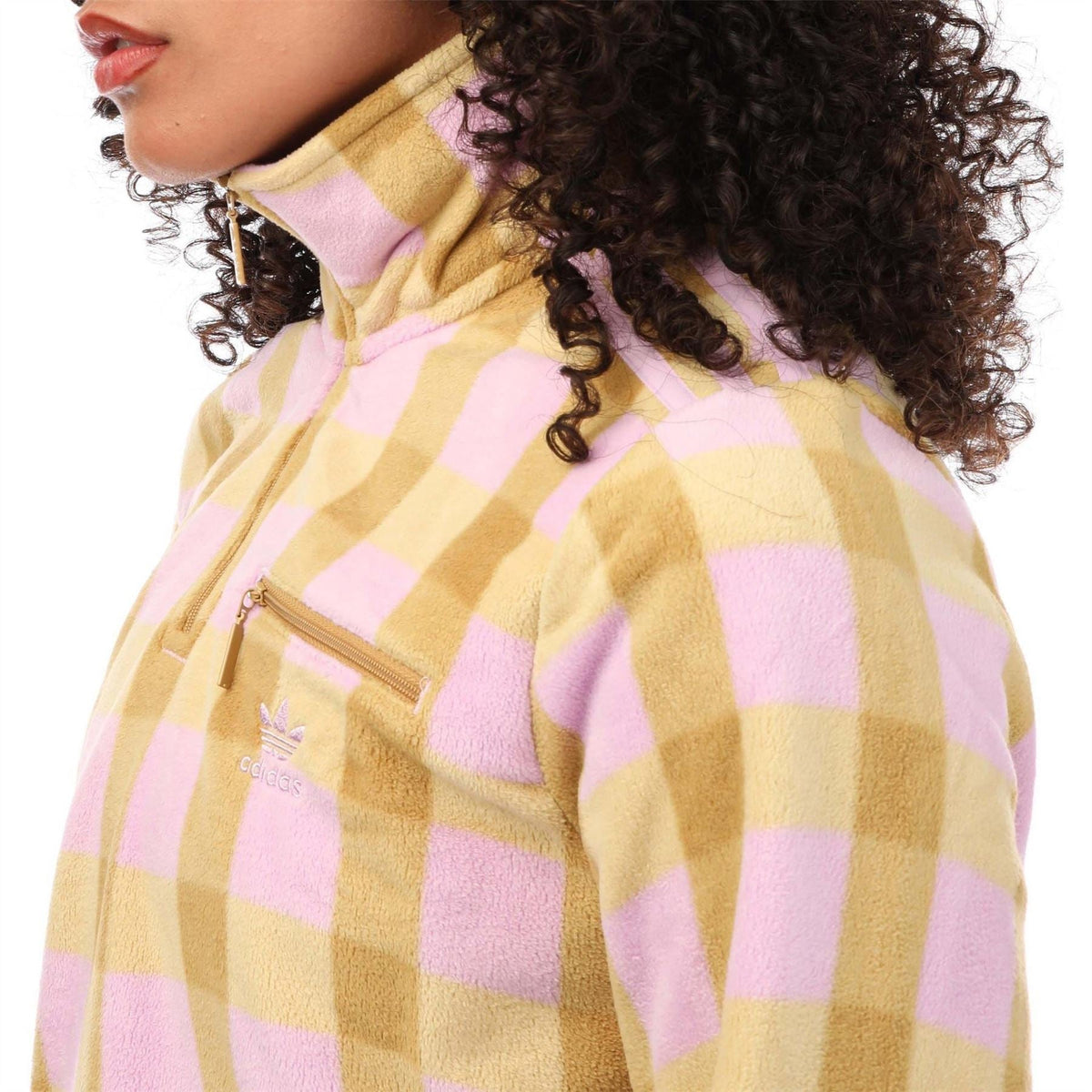 Fleece zip sweatshirt close-up of yellow and pink check high collar and logo patch