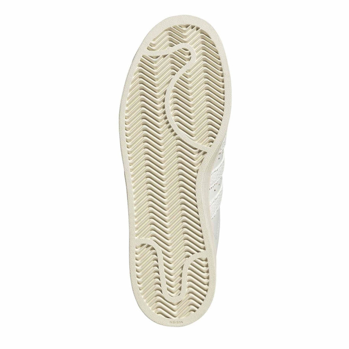White rubber outsole with textured herringbone tread pattern for adidas Superstar II sneaker.