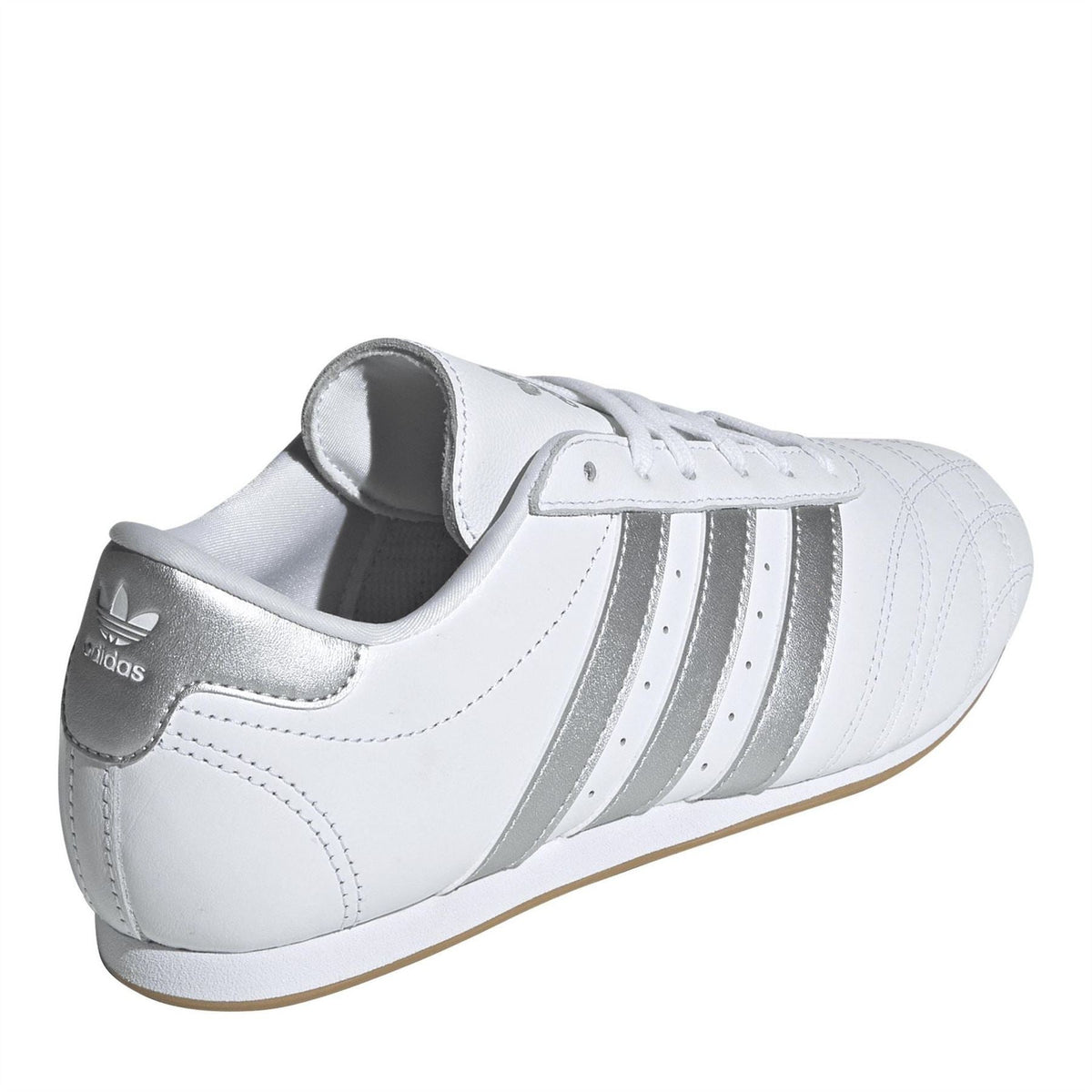 adidas Originals Taekwo low top sneakers featuring a sleek design, white and black colorway, and classic athletic style.