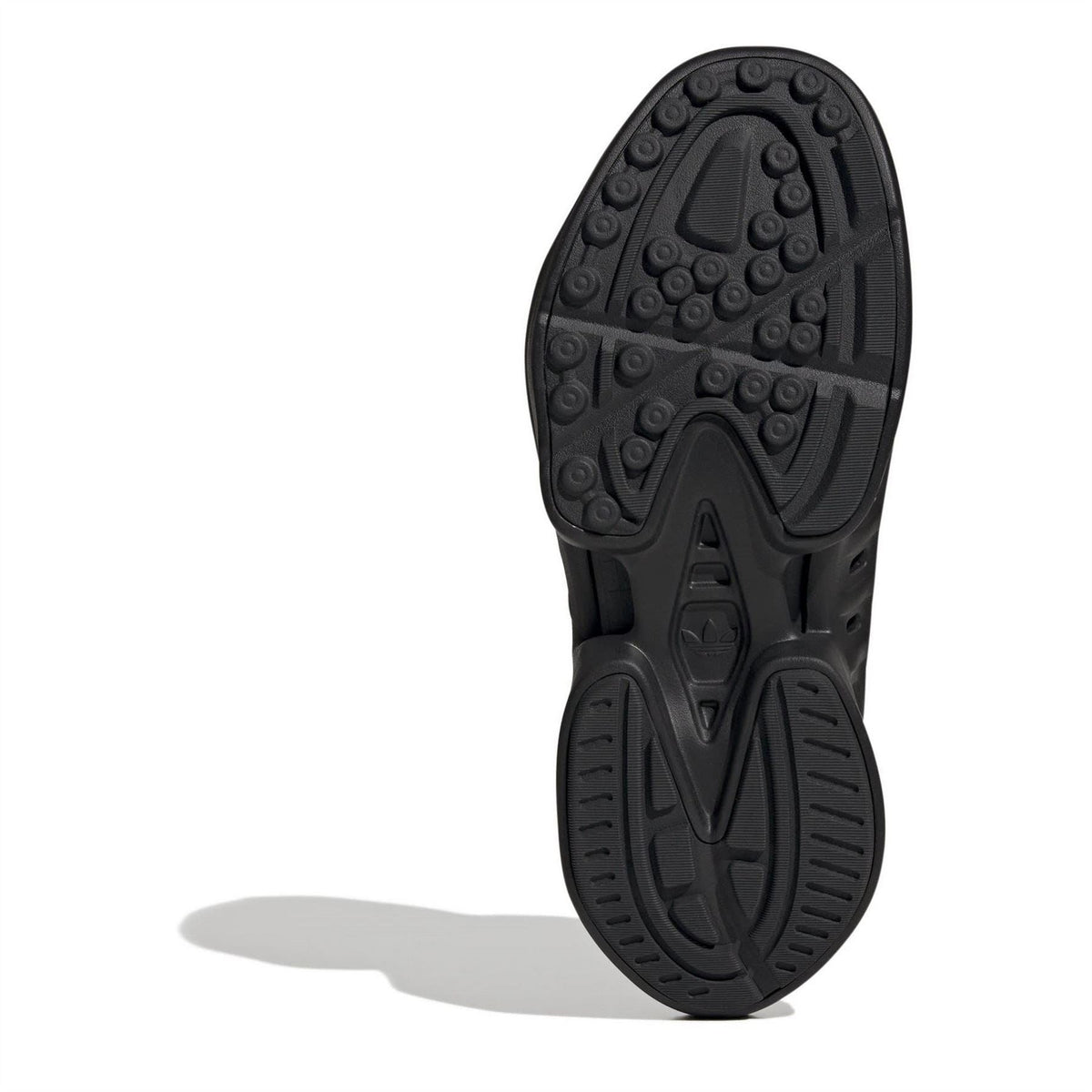 Black adidas Adifom low-top sneakers, outsole tread underside view