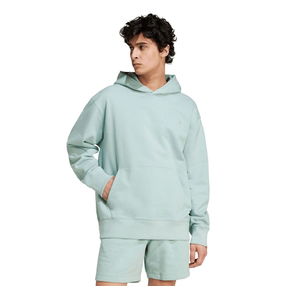 Green pullover hoodie with kangaroo pocket and drawstring hood