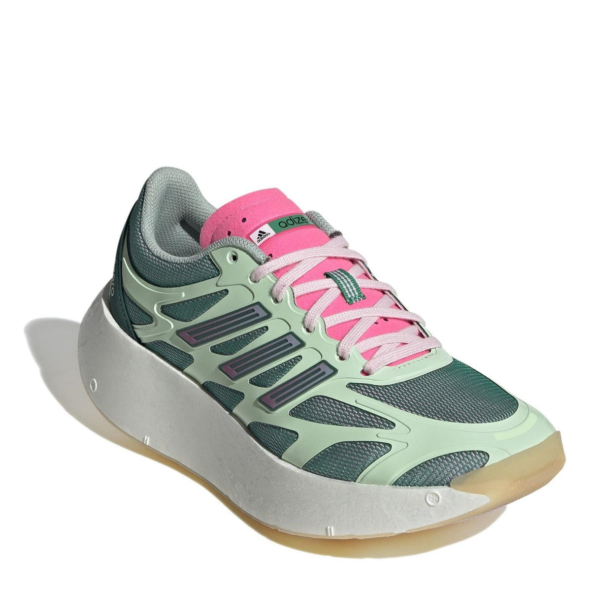 Green and pink low-top sneakers, front 3/4 view with pink collar and lace-up