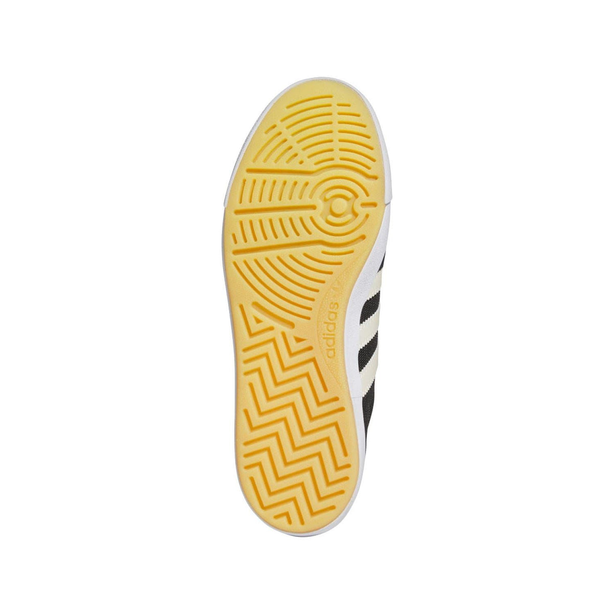Trainers outsole with yellow textured tread and adidas logo on the heel