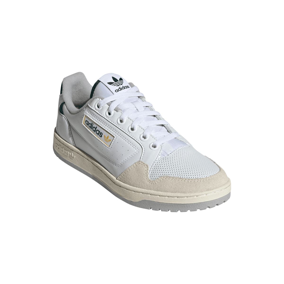 White adidas NY 90 trainers, angled side view with beige suede panels and lace-up