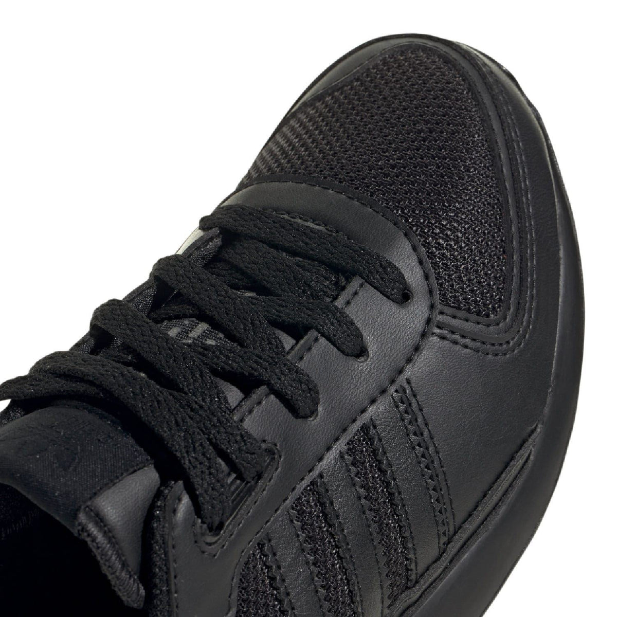 Adidas Originals LA Trainer II black trainer upper close-up with laces and textured panels