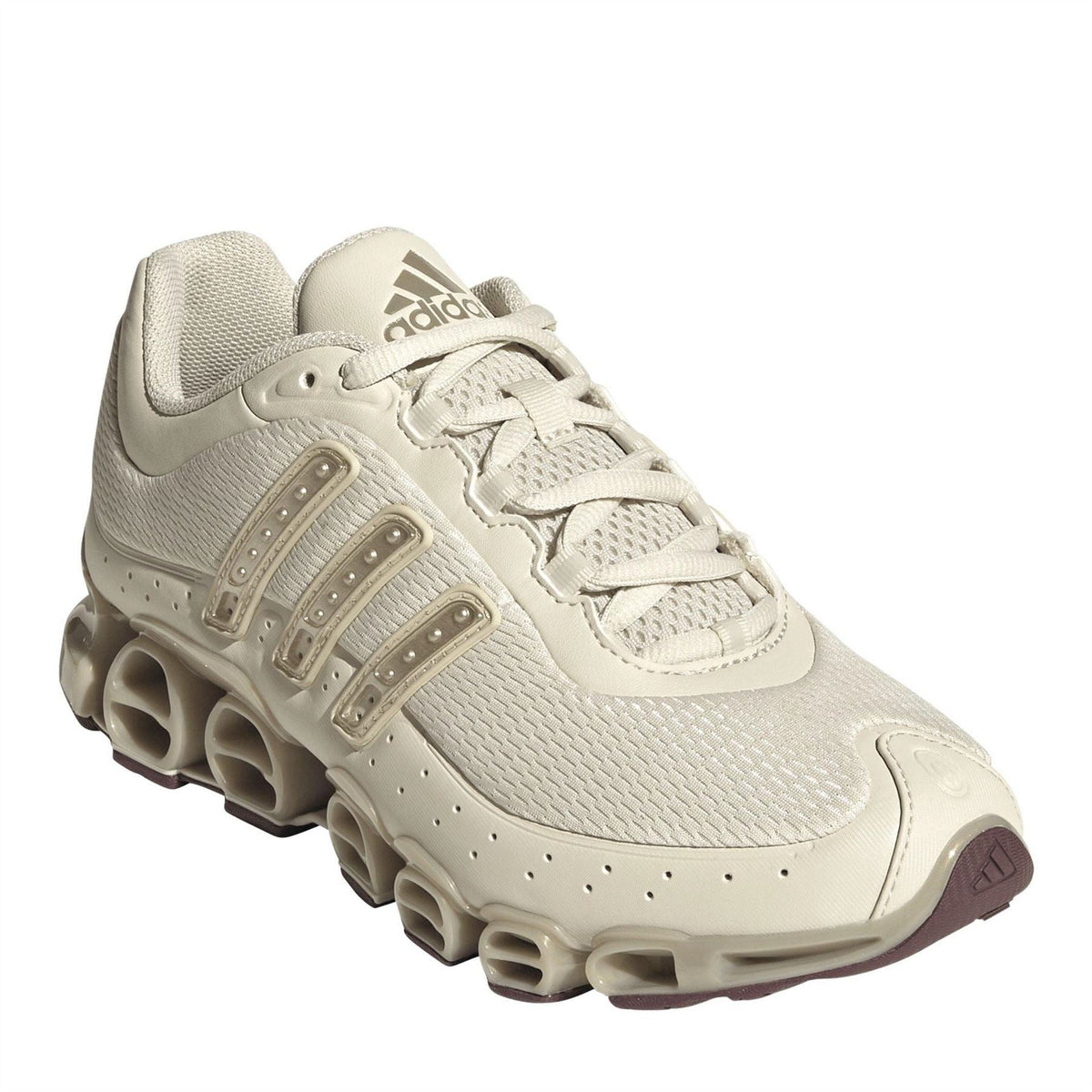 Women's light cream adidas Originals Megaride sneaker with gold-tone trim and lace-up upper