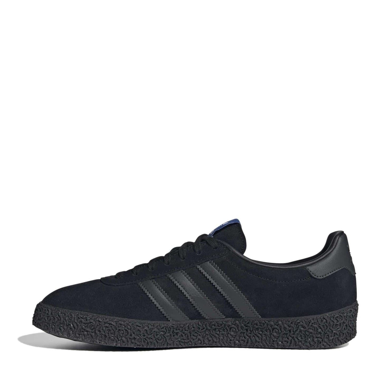 adidas Montreal trainers in dark navy suede with three stripe detailing and textured sole