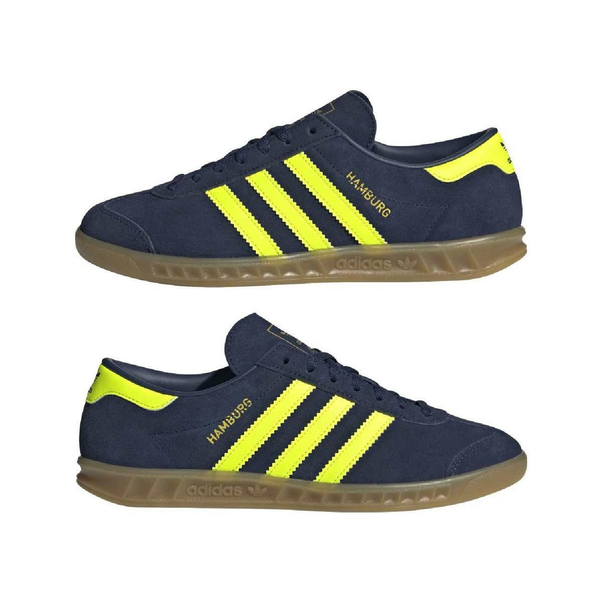 Pair of dark navy adidas Hamburg low-top sneakers with neon yellow stripes and gum soles