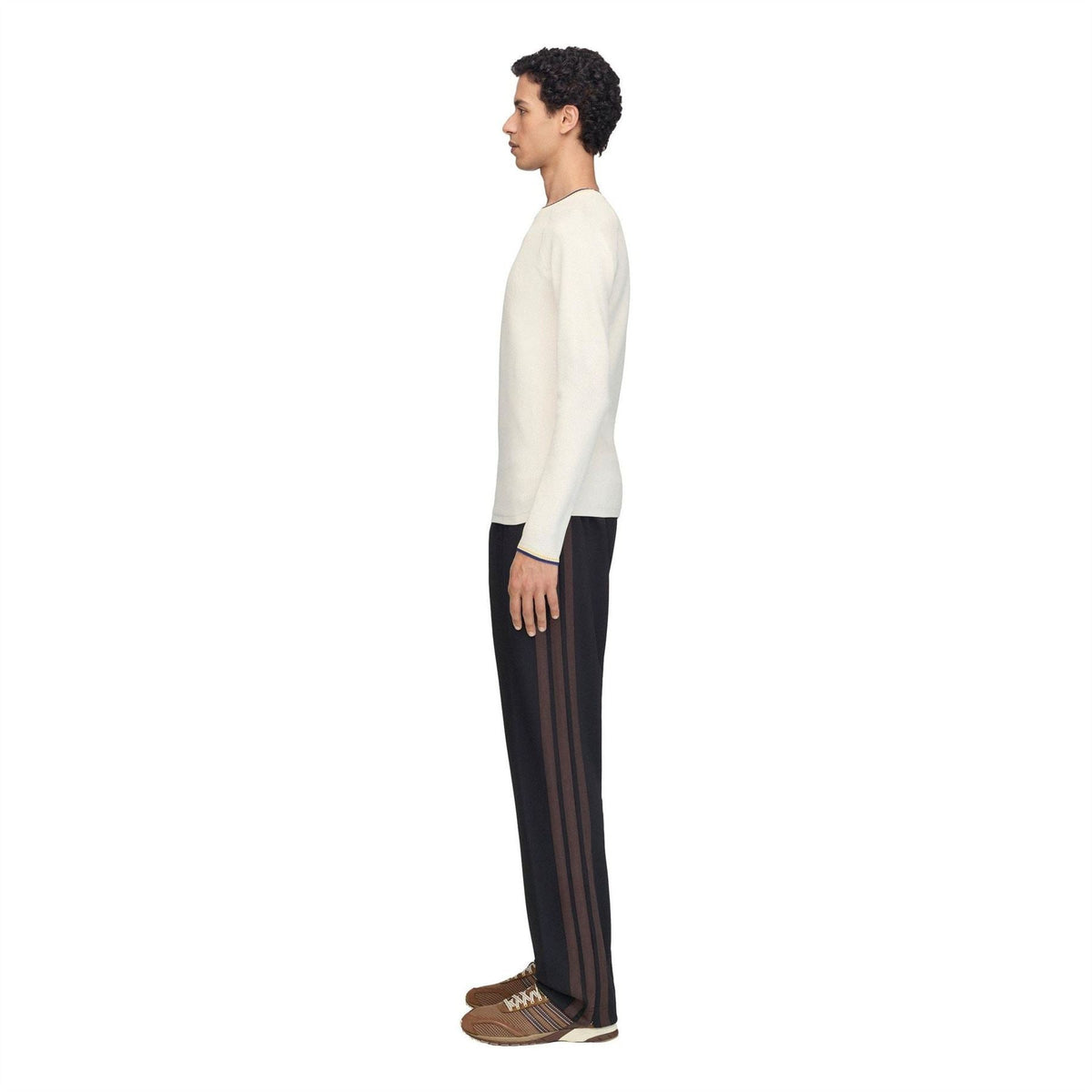 Cream knit long-sleeve top with navy and yellow trim at crewneck and cuffs