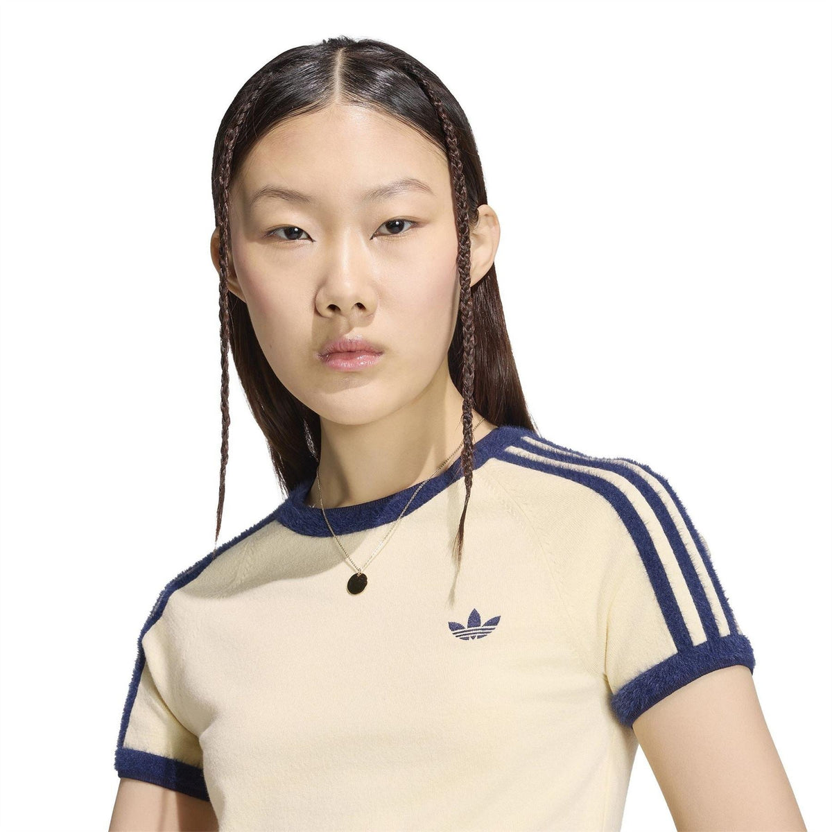 Adidas Originals knit tee close-up, vanilla knit with trefoil logo and navy stripes